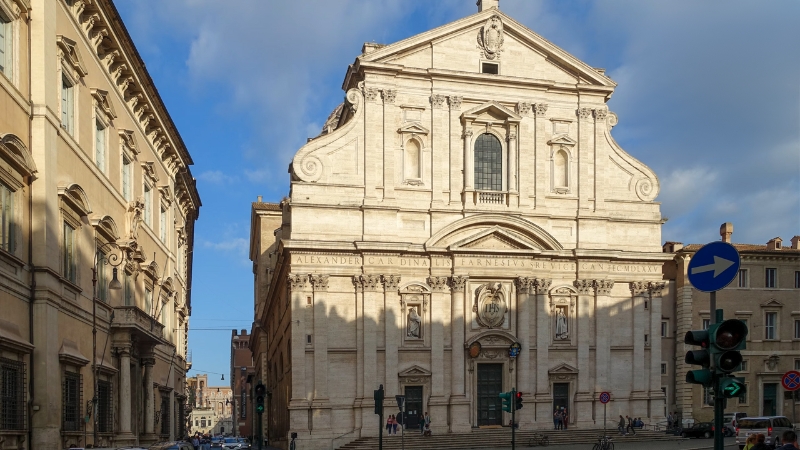 The image shows the exterior of the Church of the Gesù (Chiesa del Gesù) in Rome